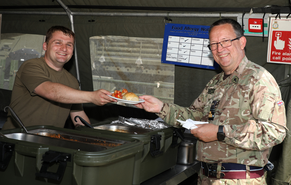 Royal Air Force Chaplain-in-Chief, Air Vice Marshal John Ellis with No 3 Mobile Catering Squadron